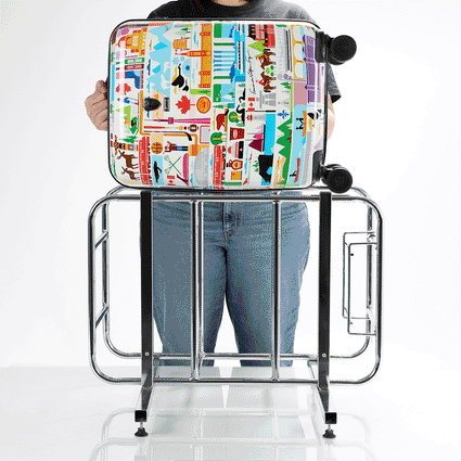 Fernando By Heys -Canada II 21" Carry-On Luggage putting in cage | Lightweight Luggage